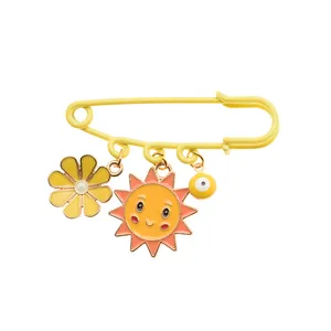 سنجاق سینه دخترانه دلنار گالری مدل بابونه و خورشید و چشم نظر