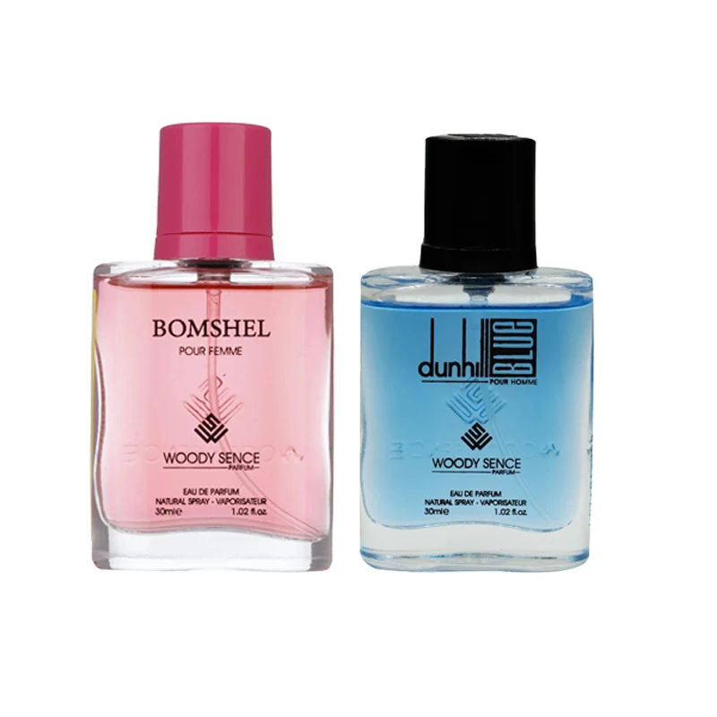 عطر جیبی مردانه وودی سنس مدل dunhill Blue حجم 30 میلی لیتر به همراه عطر جیبی زنانه وودی سنس مدل Bomshel حجم 30 میلی لیتر