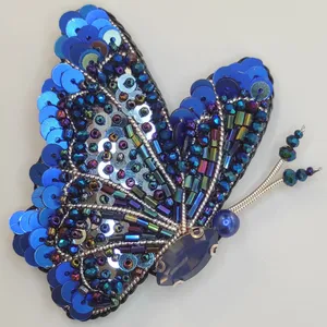 گل سینه زنانه مدل پروانه