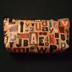 کیف لوازم آرایش زنانه مدل حروف انگلیسی کد 253