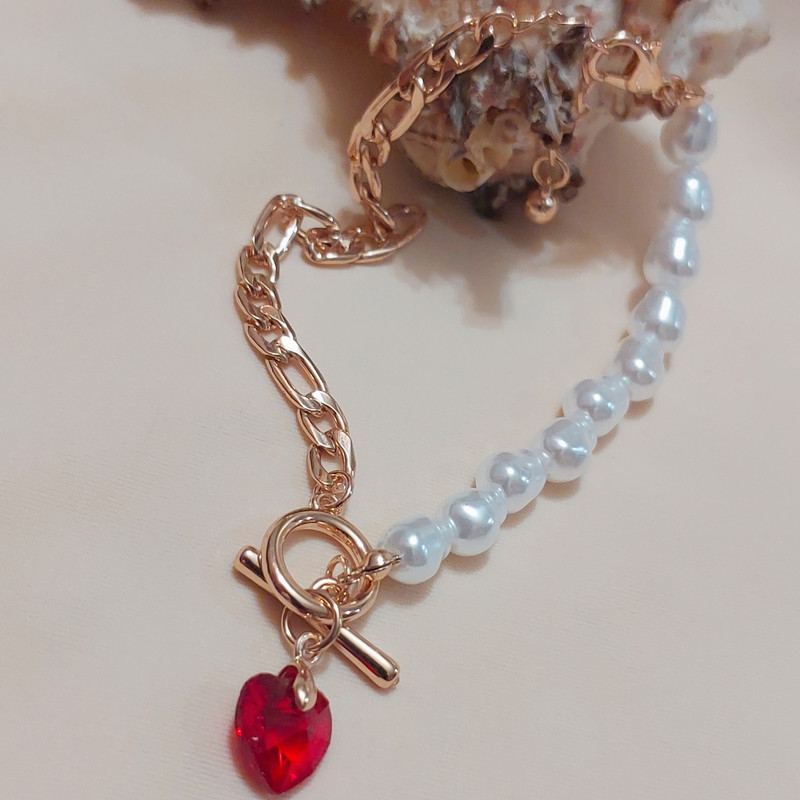 دستبند زنانه مدل قلب و مروارید زنجیری