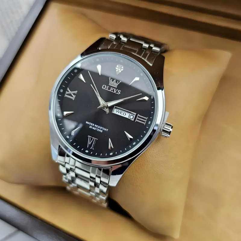 ساعت مچی عقربهای کوارتز مردانه اُ لِوز مدل کلاسیک دی دیت کد 04 ساعت مچی عقربهای کوارتز مردانه اُ لِوز مدل کلاسیک دی دیت کد 04