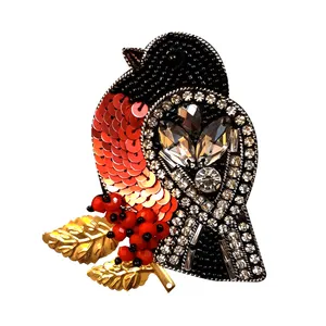 گل سینه زنانه مدل پرنده