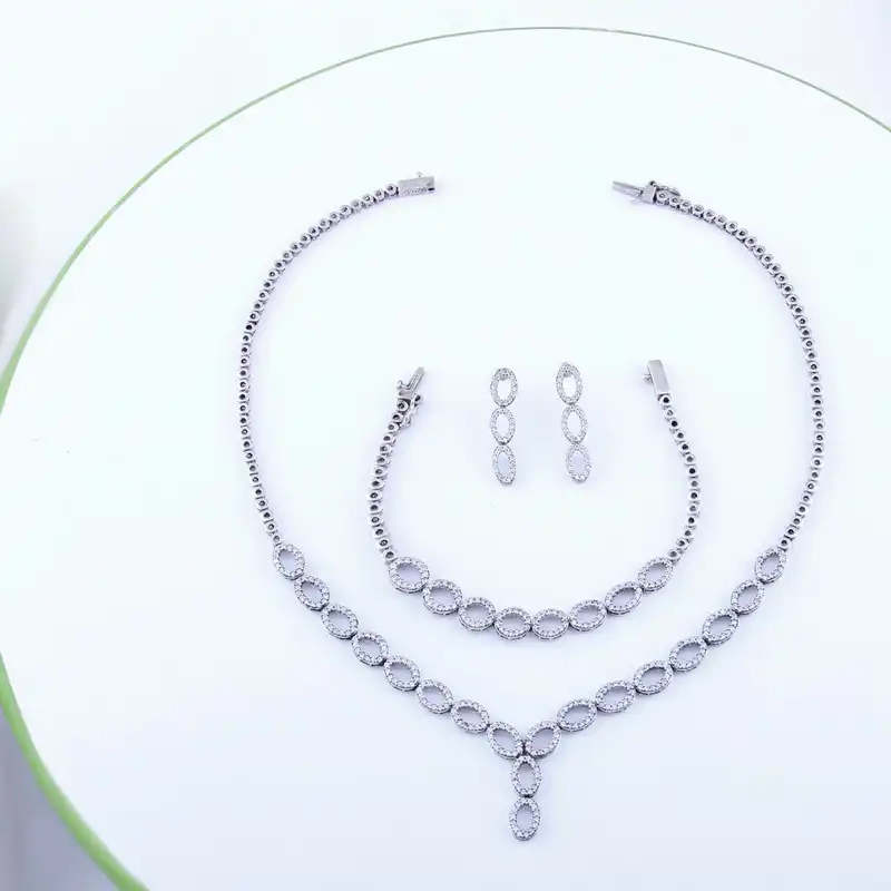 نیم ست نقره زنانه مدل  آبکاری رادیوم برلیان کاری بدون ریزش کد NTR_502