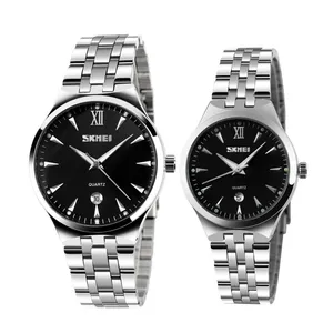 ست ساعت مچی عقربه ای زنانه و مردانه اسکمی مدل 9071bl کد 01