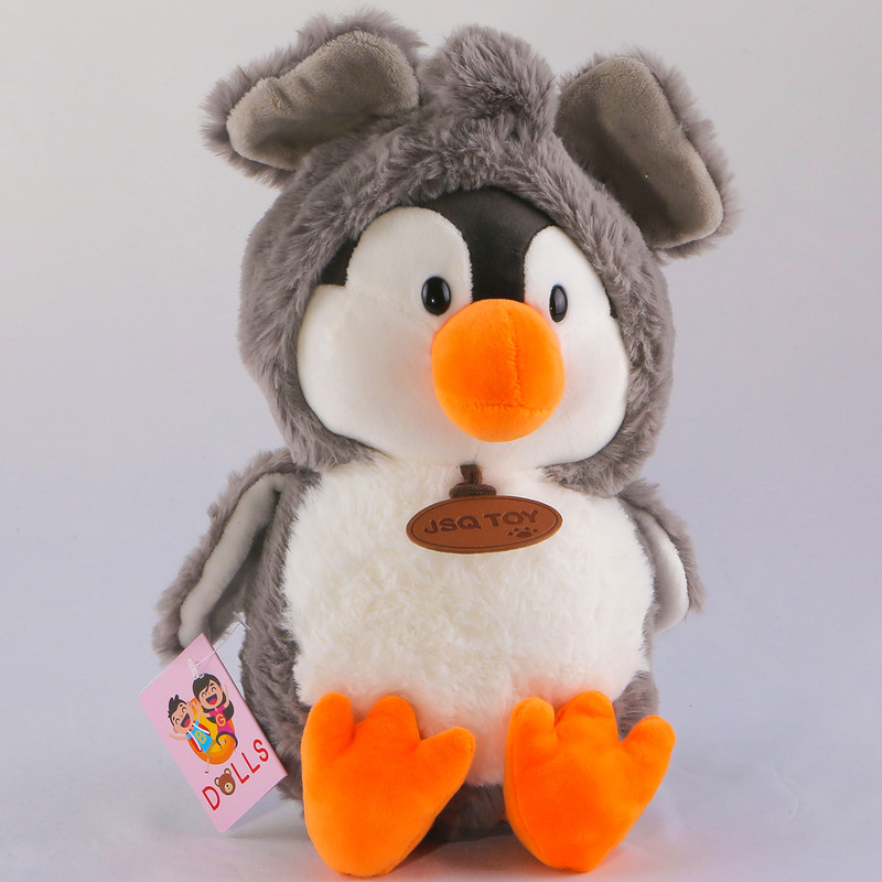 عروسک جی اس کی یو مدل پنگوئن کلاه فیلی کد BG11518 ارتفاع 30 سانتی متر