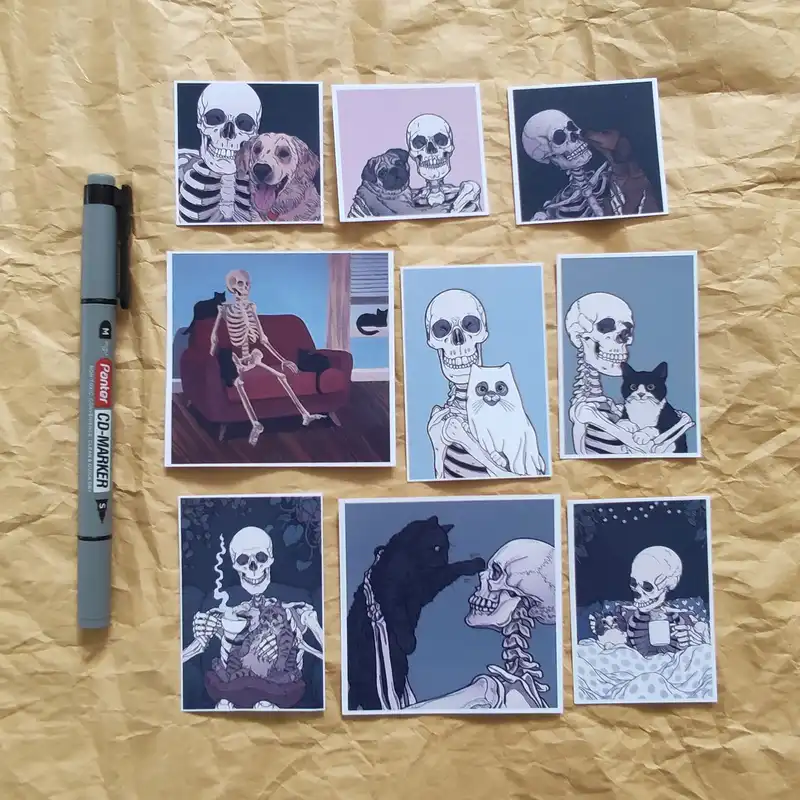 استیکر لپ تاپ طرح گربه و اسکلت کد 1001 مجموعه 9 عددی