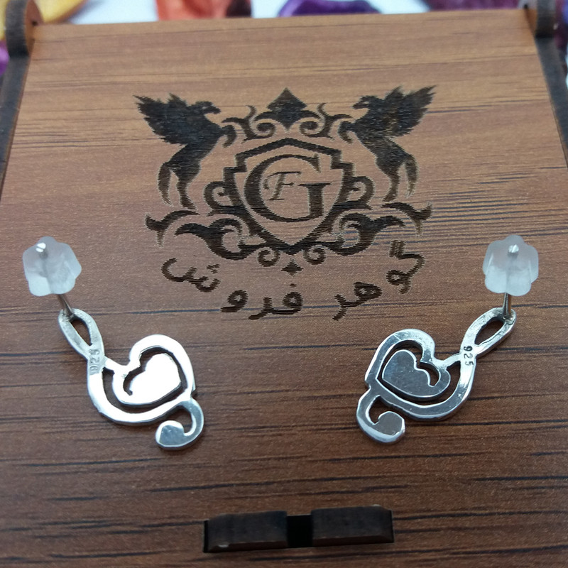 گوشواره نقره زنانه مدل نت موسیقی با قلب گوشواره نقره زنانه مدل نت موسیقی با قلب