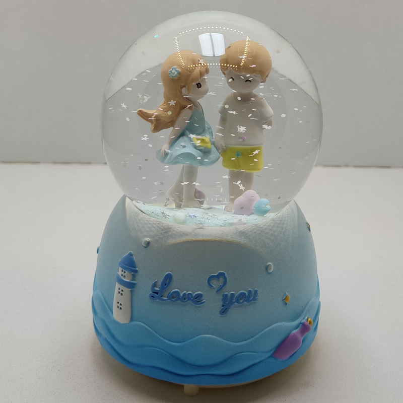 گوی موزیکال مدل پمپی طرح دیدار عاشقانه