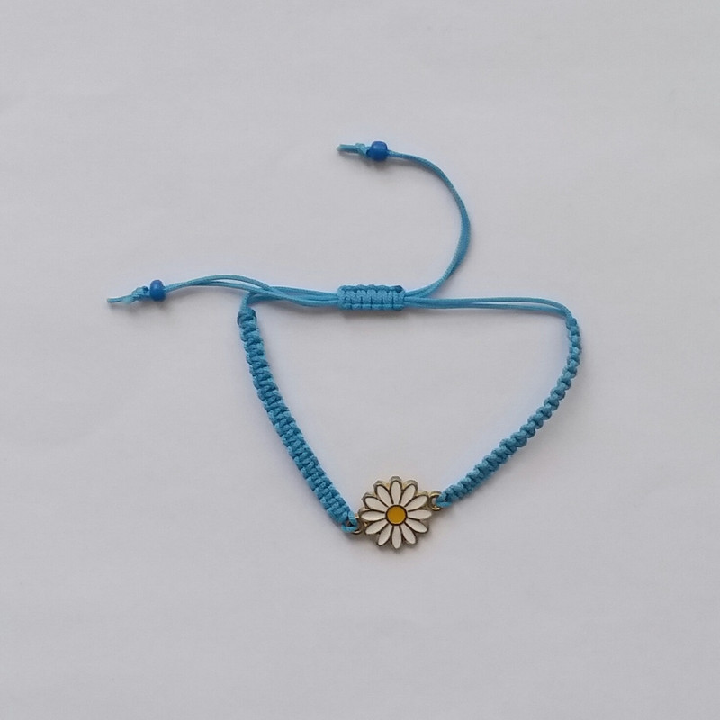 دستبند دخترانه مدل گل بابونه NA122 دستبند دخترانه مدل گل بابونه NA122