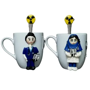 لیوان سرامیکی مدل دختر و پسر پزشک رادیولوژی کد 03018 مجموعه 2 عددی به همراه قاشق