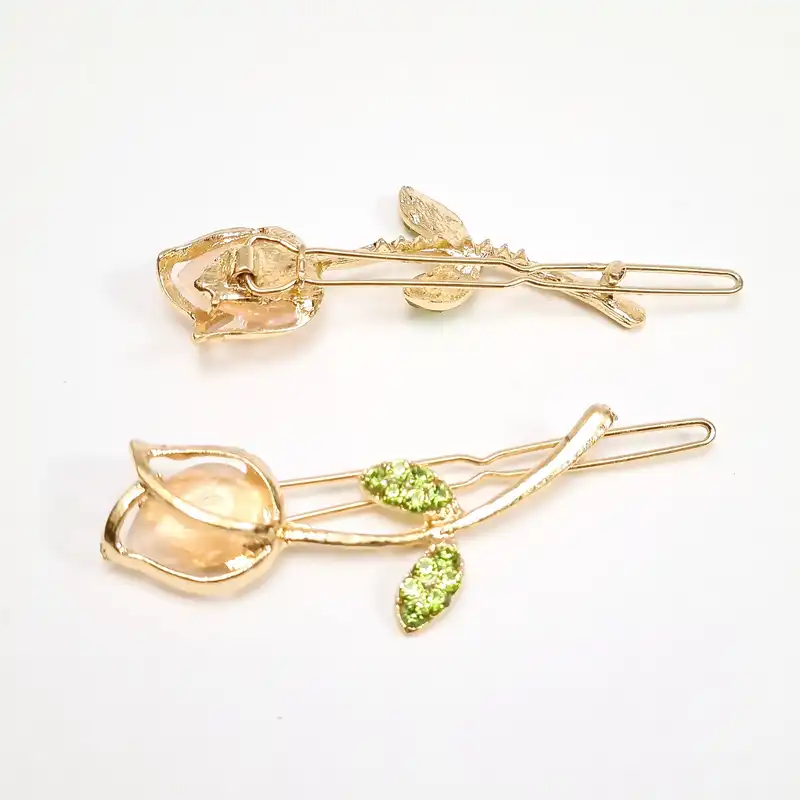 گیره مو زنانه مدل نگین دار طرح گل لاله کد brg 1995