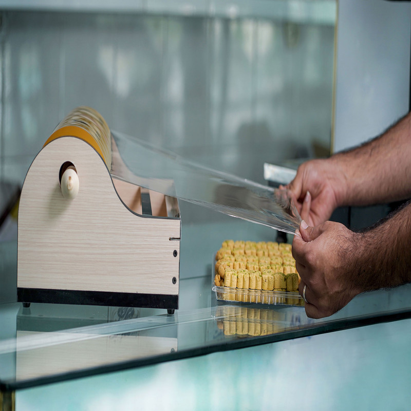 دستگاه سلفون کش ایزیکات کدAt 1001