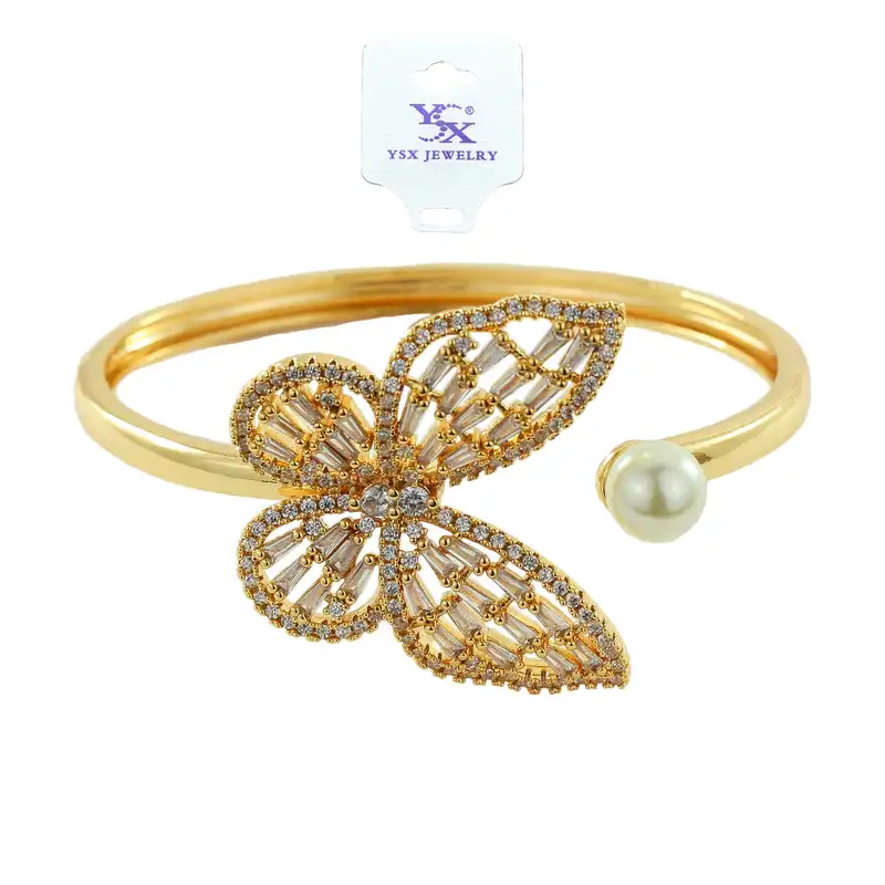 دستبند النگویی زنانه وای اس ایکس مدل پروانه و مروارید کد AAD-95