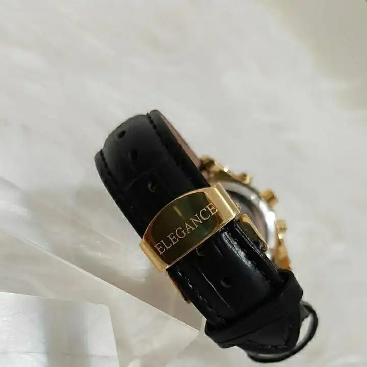 ست ساعت مچی عقربه ای زنانه و مردانه الگانس مدل بند چرمی تک موتوره کد 07