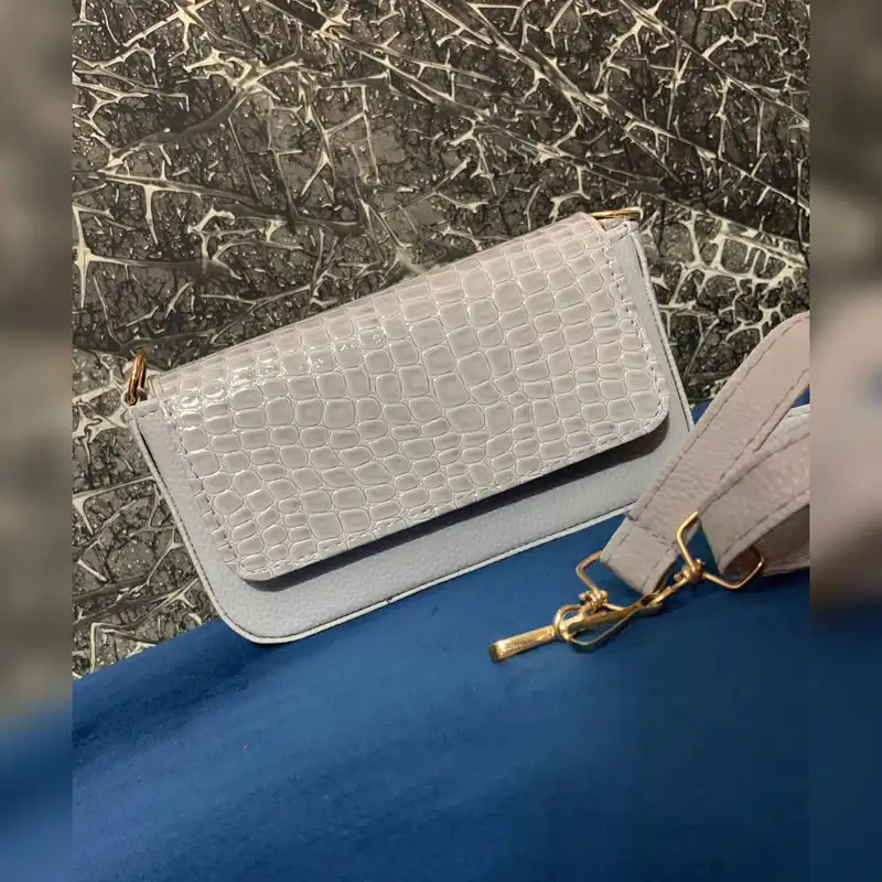 کیف دوشی زنانه مدل پوست ماری دراگون