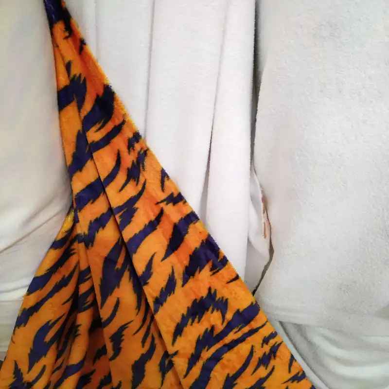 پارچه لباس مدل مخمل سابتل طرح پلنگی کد PO150