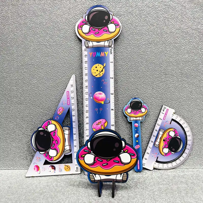 بسته لوازم تحریر مدل فضانورد و دونات مجموعه 5 عددی