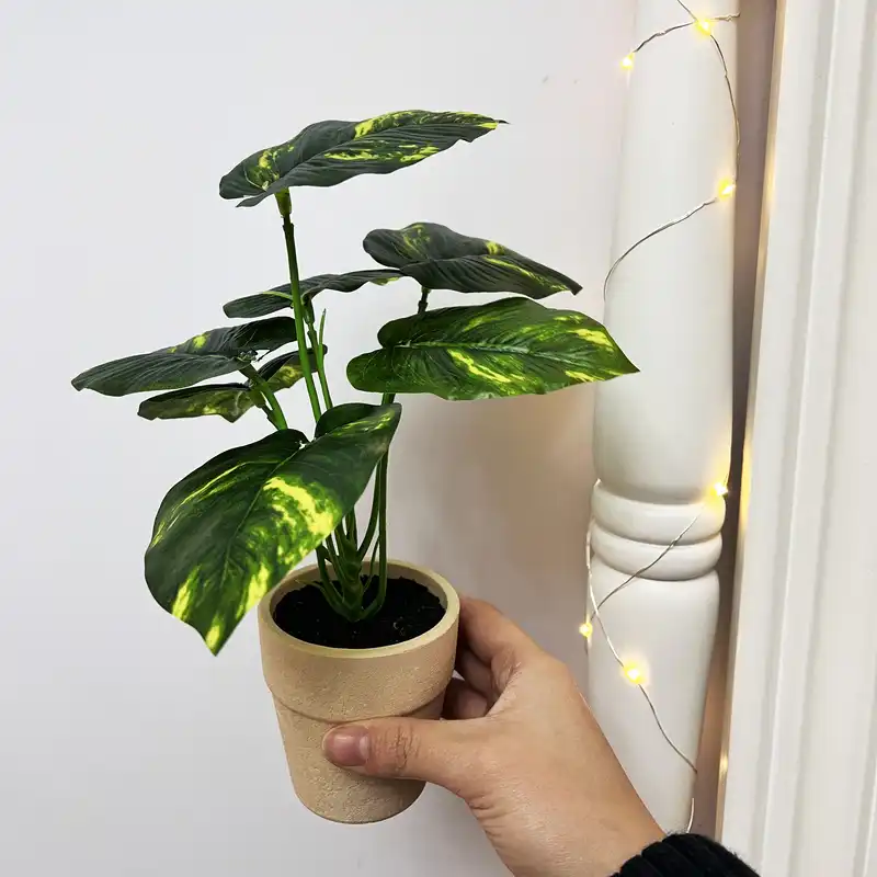 گلدان به همراه گل مصنوعی مدل پتوس 2