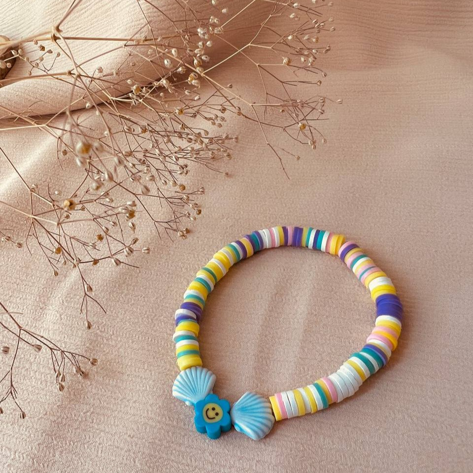 دستبند دخترانه مدل فیمو صدف و گل