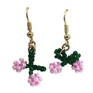 گوشواره زنانه اکسسوریز مدل گل پاپیونی