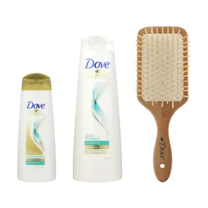 شامپو مو داو مدل Daily Moisture حجم 400 میلی لیتر به همراه نرم کننده داو مدل  Daily Moisture حجم 200 میلی لیتر به همراه برس چوبی هدیه