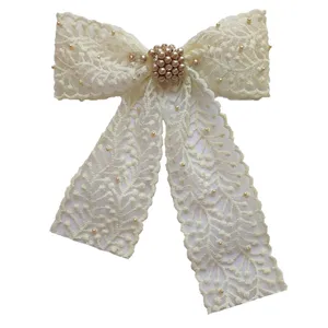 کش مو زنانه مدل پاپیون مرواریدی