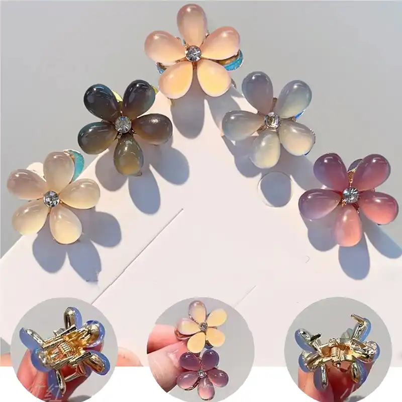 کلیپس مو زنانه مدل مینی شکوفه آبنباتی کد 59 brg بسته 2 عددی