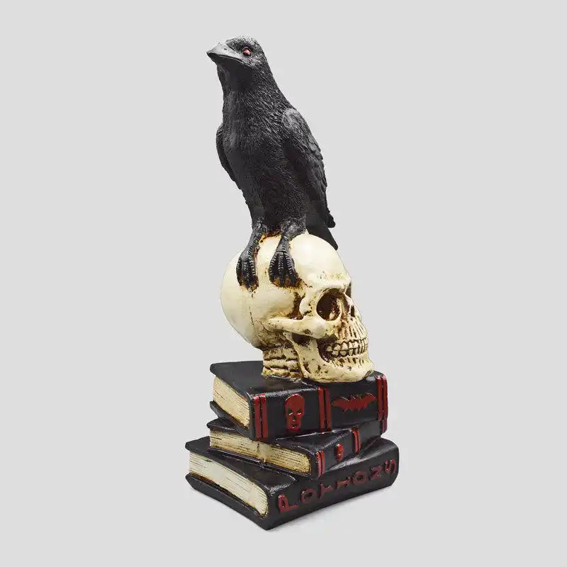 مجسمه مدل کلاغ و جمجمه و کتاب