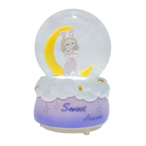  گوی موزیکال مدل متوسط برفی چراغ دار دختر خرگوش به دست و ماه کد 3324