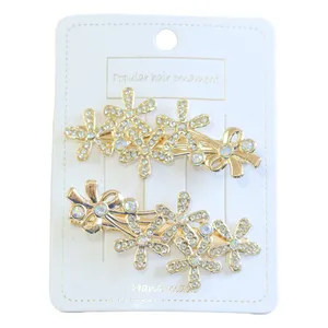 گیره مو زنانه طرح گل مدل s00 بسته 2 عددی