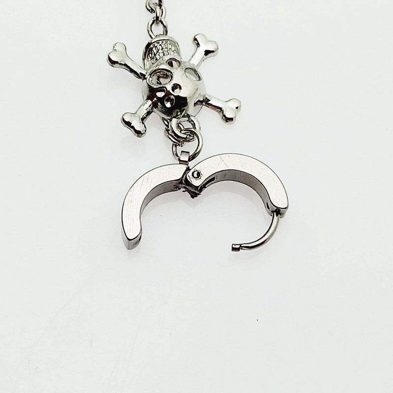 پیرسینگ گوش طرح جمجمه و زنجیر مدل 559PRMZ