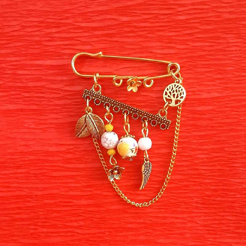 سنجاق سینه دخترانه مدل برگی از درخت کد 1527 سنجاق سینه دخترانه مدل برگی از درخت کد 1527