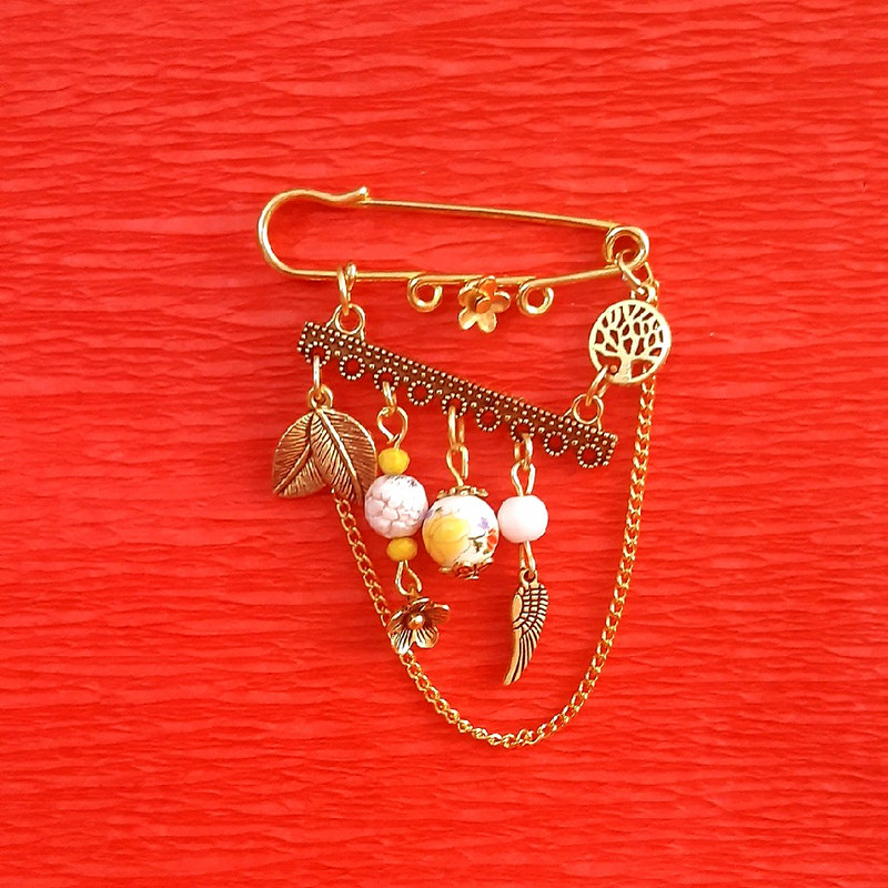 سنجاق سینه دخترانه مدل برگی از درخت کد 1527 سنجاق سینه دخترانه مدل برگی از درخت کد 1527