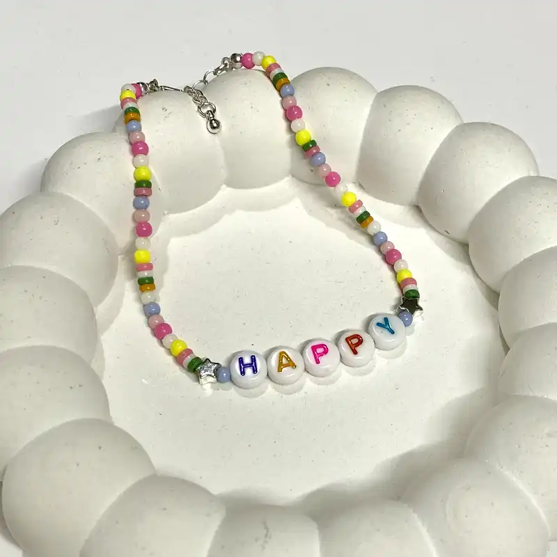 پابند زنانه مدل آلفابت مهره ای