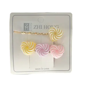 سنجاق مو دخترانه مدل 0007  طرح آبنبات بسته 2 عددی