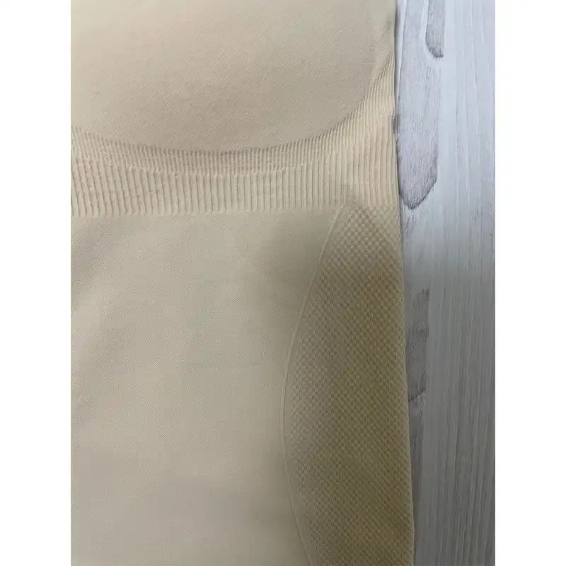 تاپ ورزشی زنانه مدل QIANTKE