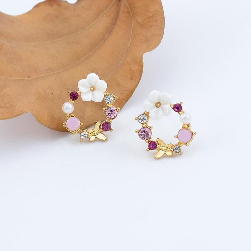 گوشواره زنانه مدل دایره نگینی کد 00599 گوشواره زنانه مدل دایره نگینی کد 00599