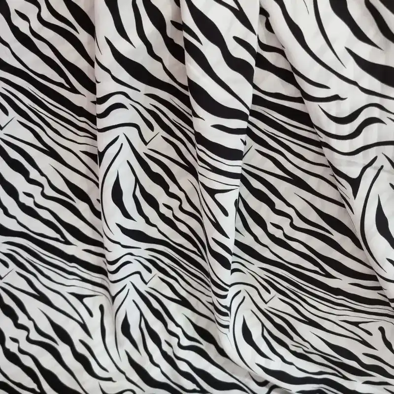 پارچه لباس مدل کودری نخی طرح پلنگی کد ZB