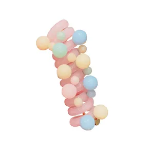 کش مو زنانه مدل فنری طرح دانه های پاستیلی