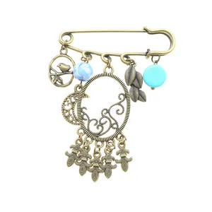 سنجاق سینه زنانه دلنار گالری مدل رز و گنجشک