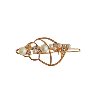 گیره مو زنانه مدل صدف مرواریدی