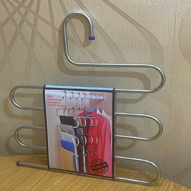 عکس شماره 10 : چوب لباسی شلوار و شال لینو مدل مارپیچ بسته 2 عددی