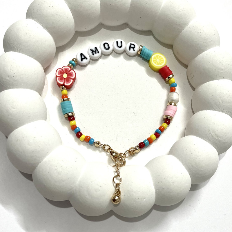 دستبند دخترانه اکسسورایز مدل میوه و گل