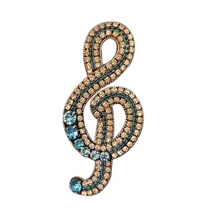 گل سینه زنانه مدل نت ملودی