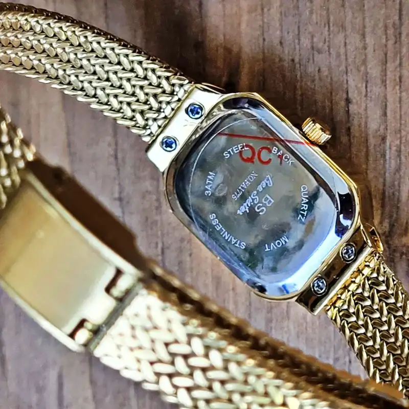 ساعت مچی عقربه ای زنانه مدل حصیری دورنگین خطی 02