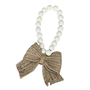 آویز تزیینی مدل مهره و پاپیون کنف