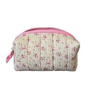 کیف لوازم آرایش زنانه مدل پاپیون و گل