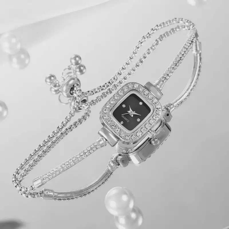 ساعت مچی عقربه ای زنانه مدل دور نگین بند کراواتی کد 7