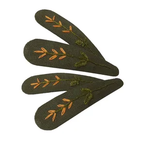 گیره مو دخترانه مدل تق تقی گلدوزی شده HT -0014 مجموعه چهار عددی